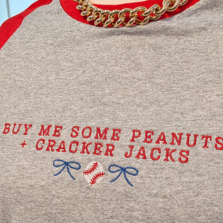 ’Buy Me Some Peanuts and Cracker Jacks’ Embroidered Raglan T-Shirt - Apparel