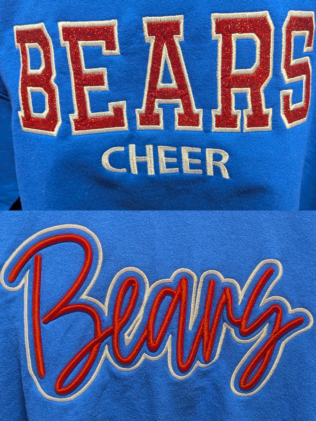 Four cheerleaders in pink cheer hoodies and white shorts posing in a gymnasium.