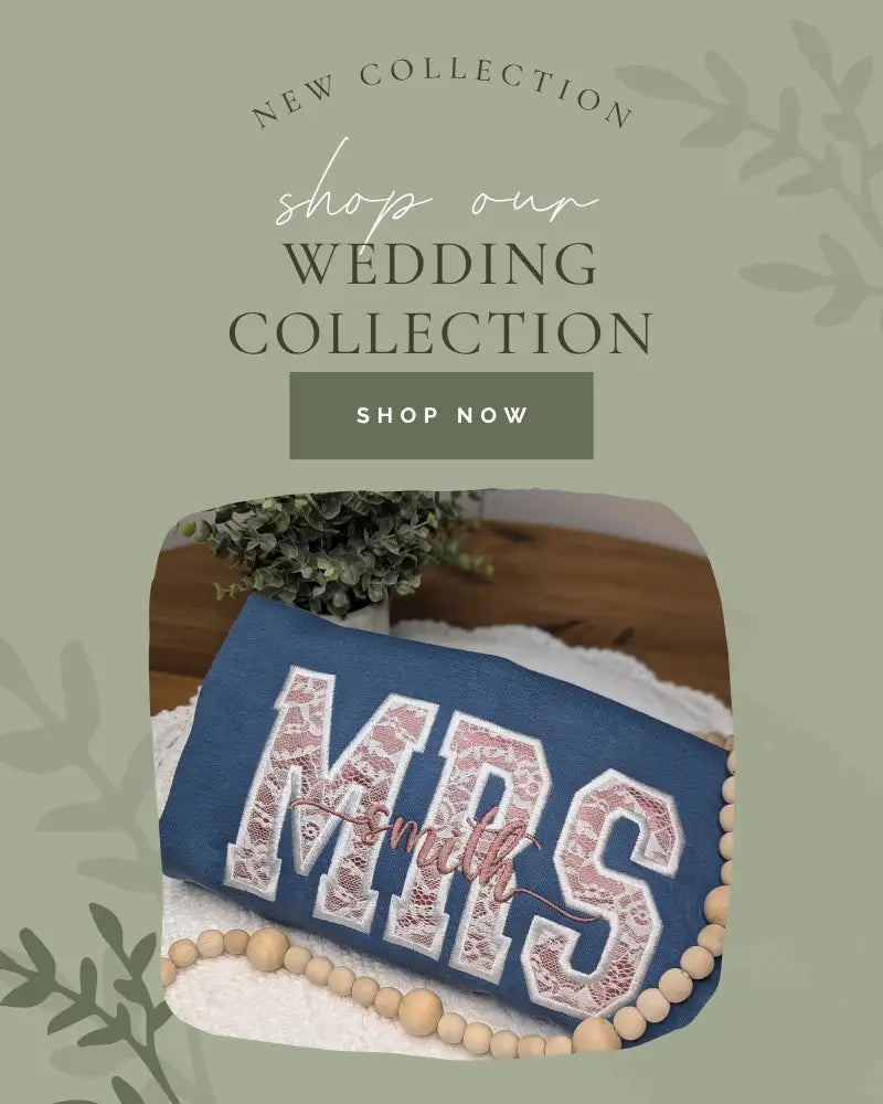 Blue embroidered ’mrs’ pillow with lace trim and wooden bead border.