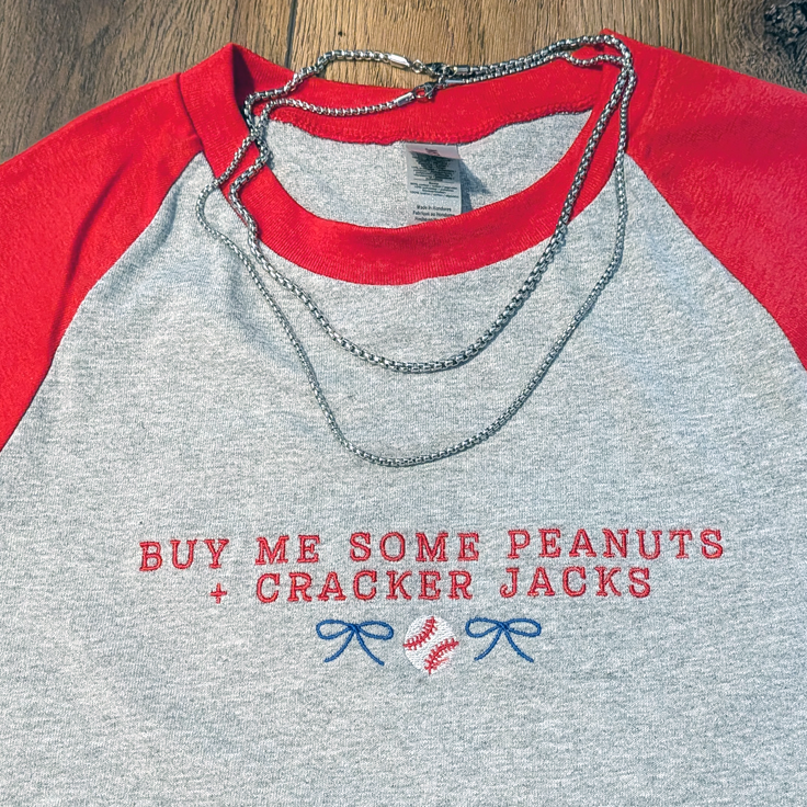 ’Buy Me Some Peanuts and Cracker Jacks’ Embroidered Raglan T-Shirt - Apparel