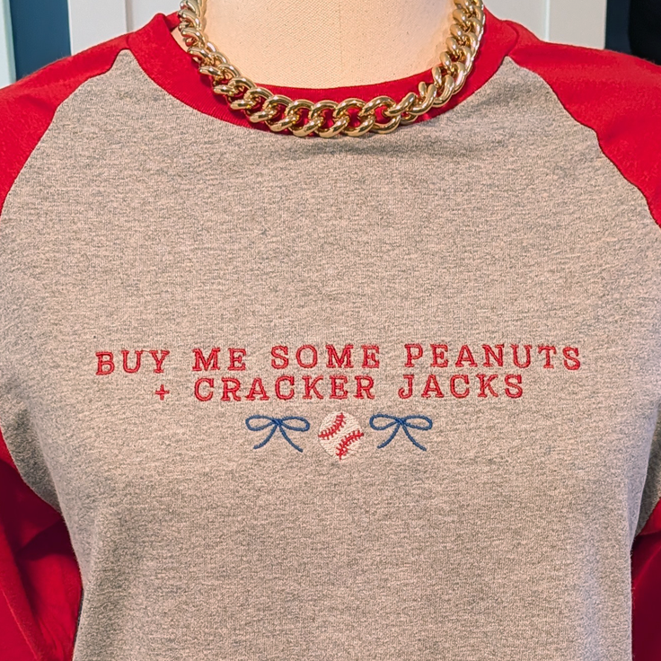 ’Buy Me Some Peanuts and Cracker Jacks’ Embroidered Raglan T-Shirt - Apparel