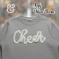 Gray Gildan crewneck sweatshirt with white yarn Cheer text, Twist & Thread Co branding