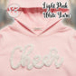 Light pink Gildan hoodie with white yarn "Cheer" applique, Twist & Thread Co. branding