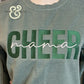 Green sweatshirt with embroidered bold 'CHEER' and cursive 'mama' text, premium custom apparel