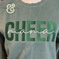 Green sweatshirt with embroidered bold 'CHEER' and cursive 'mama' text, premium custom apparel