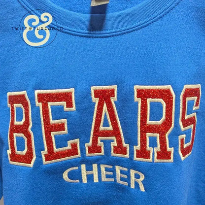Blue embroidered sweatshirt with red glitter 'BEARS' and gold 'CHEER' text, Twist & Thread Co.