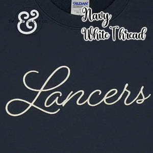 Navy blue Gildan shirt with white embroidered 'Lancers' script and Twist & Thread Co logo
