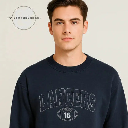 Man wearing navy blue sweatshirt with 'LANCERS' and football graphic logo, studio background