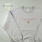Light gray embroidered sweatshirt with 'dog mom' and paw print by Twist & Thread Co.
