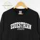 Black Gildan sweatshirt with white embroidered text 'EQUESTRIAN ATHLETE' hanging on wooden hanger