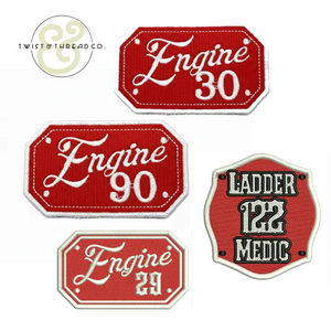 Red embroidered fire department patches with white text: Engine 30, Engine 90, Engine 29, and Ladder 122 Medic