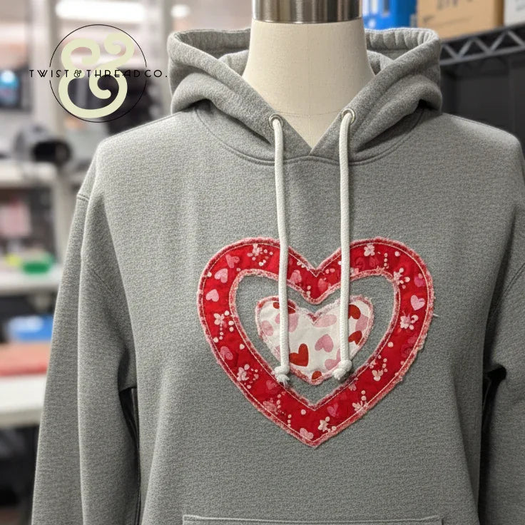 Gray hoodie with red heart applique embroidery, Twist & Thread Co. custom apparel