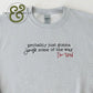 Gray sweatshirt with text saying 'probably just gonna jingle some of the way I'm tired' in black and red fonts