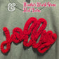 Heather dark green sweatshirt with red yarn 'jolly' chenille patch embroidery