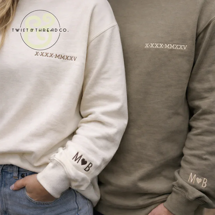 Couple wearing personalized embroidered sweatshirts by Twist & Thread Co. with custom initials
