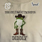 Sand-colored fabric with embroidered green frog wearing brown cowboy boots and hat, text 'The only squat I'm doin' is diddly'