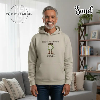 Sand-colored hoodie with cartoon frog wearing boots and hat, text saying 'The only sciatomdoin's diddly'