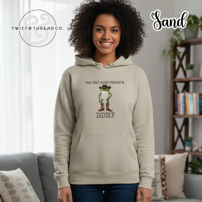 illustration of a green frog wearing a bear hat and boots with text The only squatwiddon's diddly