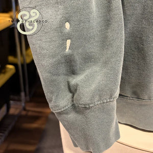 Custom embroidered sage green hoodie sleeve with semicolon design by Twist & Thread Co.