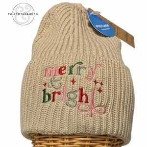 Beige knit winter hat with 'merry & bright' embroidered in colorful holiday letters